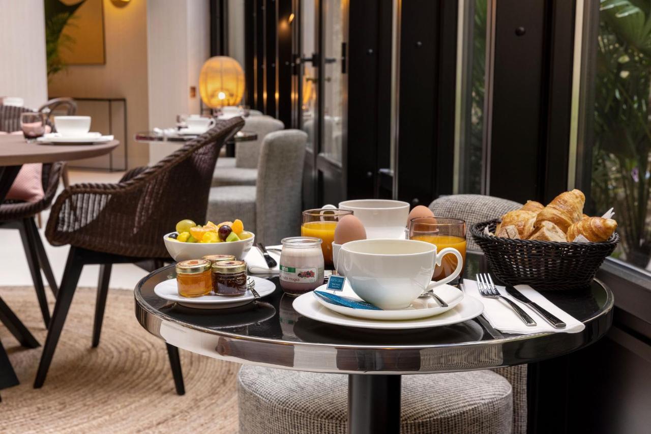 Hotel Moderniste Paris Bagian luar foto